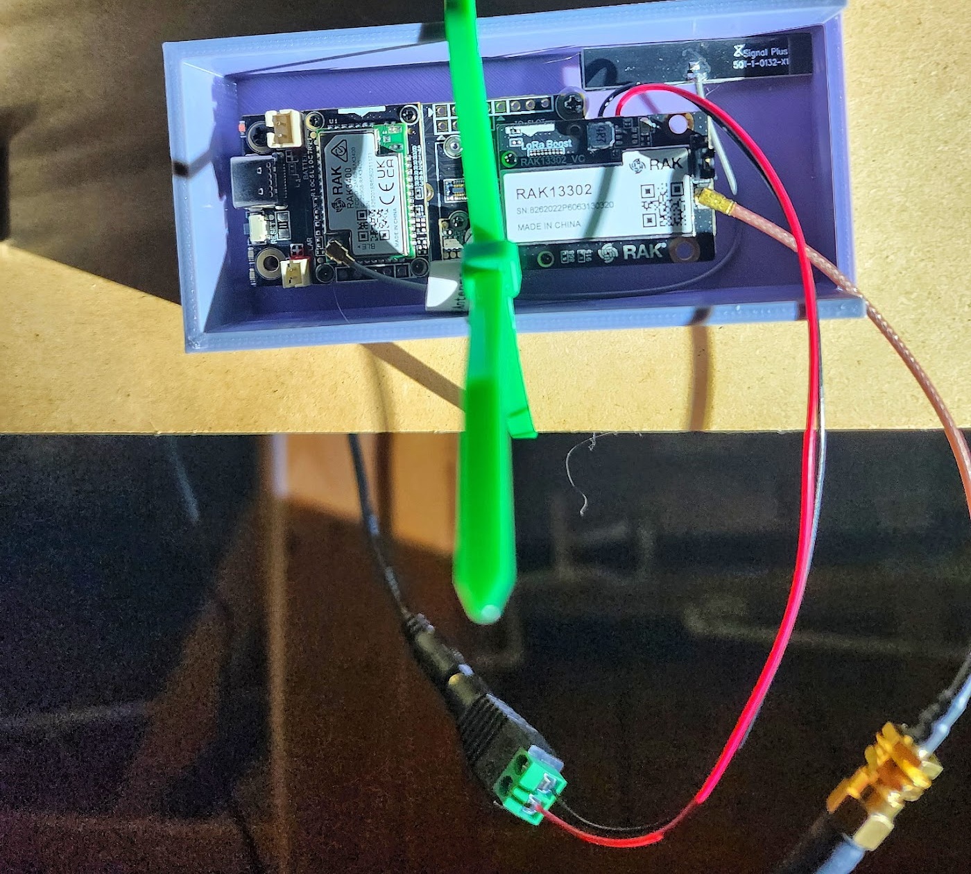 5V DC power connected to the external power port on the back of the RAK13302 booster